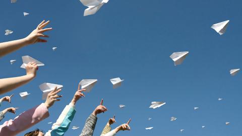 paper airplanes flying